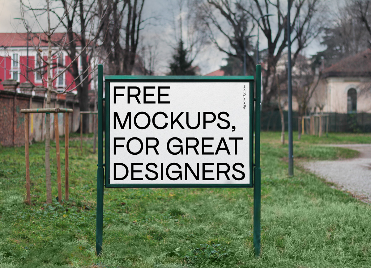 Free Mockup, editable image, of an horizontal framed outdoor billboard, poster, located in park. This picture, with a characteristic urban flare, was taken in Milan, Italy.
