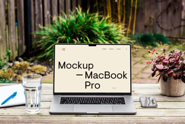 Free Macbook Pro on Wood Desk PSD Mockup