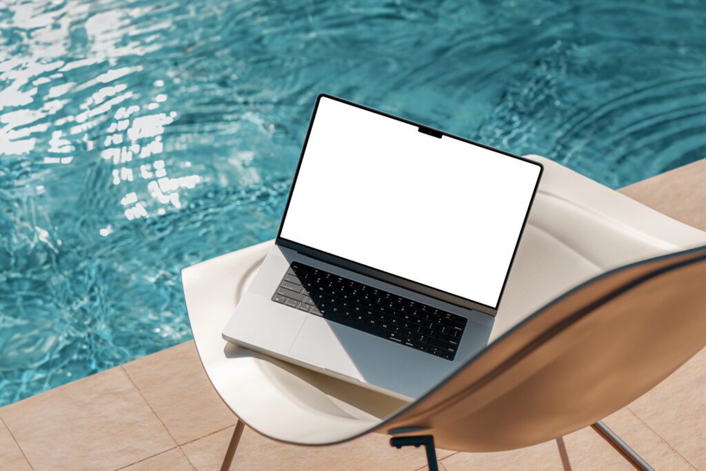 Free Macbook Pro at the Pool PSD Mockup - A Type of Amigo