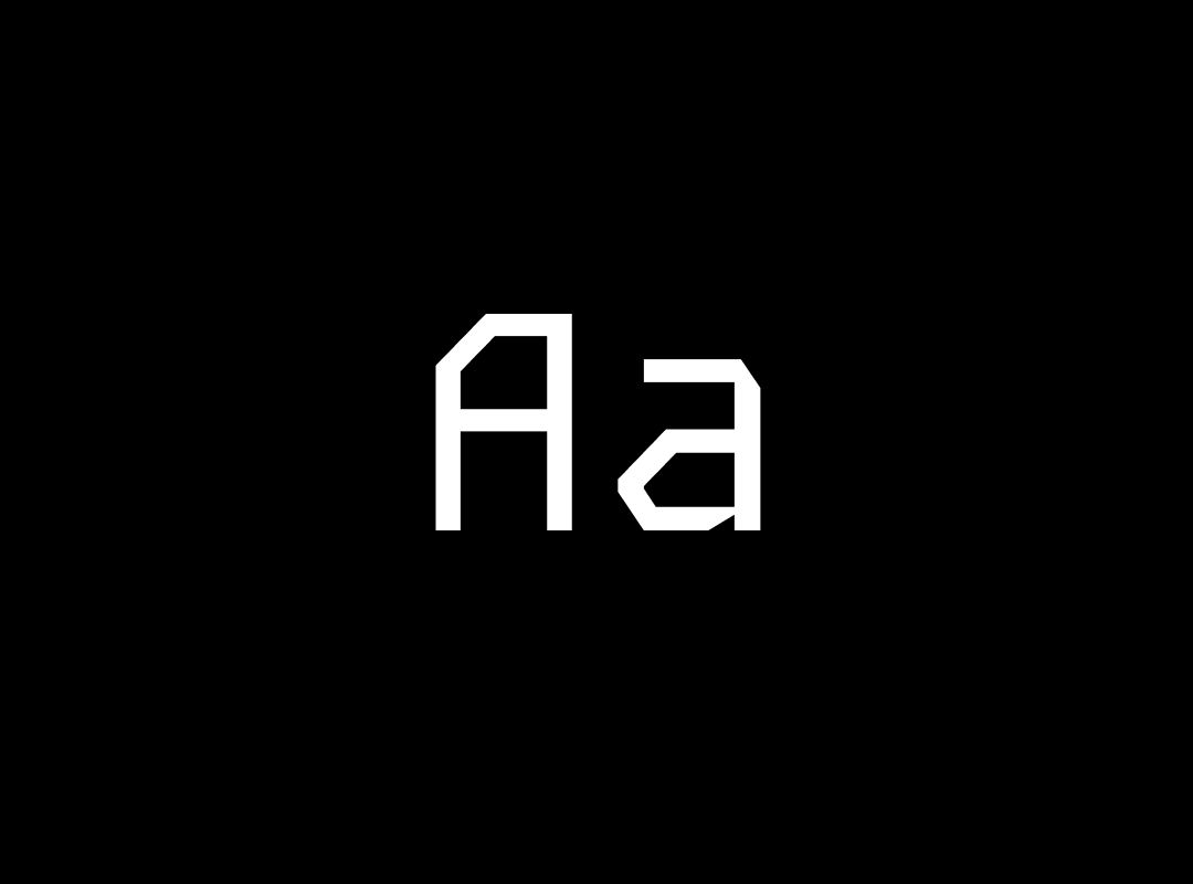 A large "Aa" in the Kode Mono font, a monospaced typeface, displayed in white on a black background.