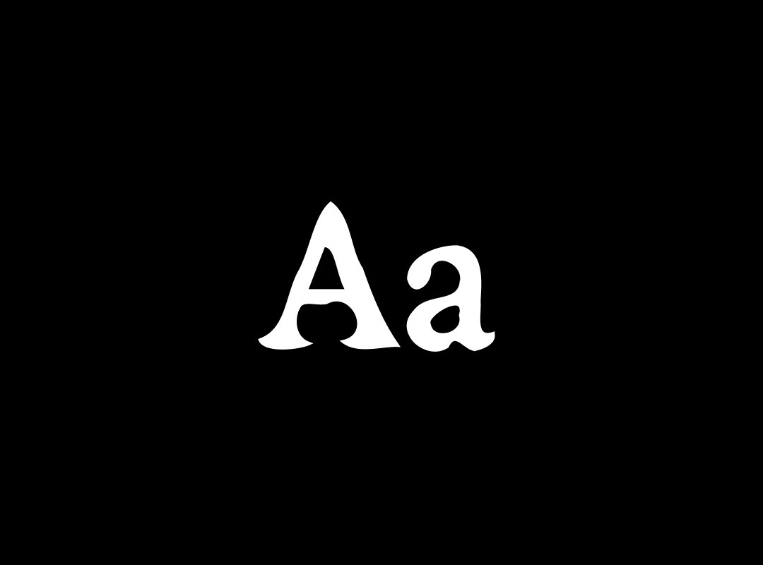 A graphic display of the Adelphe Trouble font featuring the uppercase and lowercase letters "Aa" in a serif style with inclusive design details.