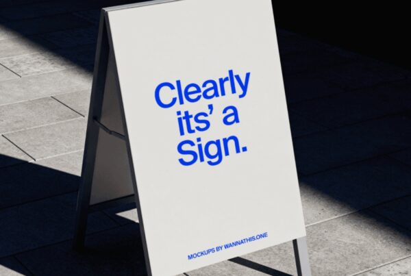 An outdoor A-frame sidewalk sign stand on tiled urban pavement with realistic sunlight shadows.