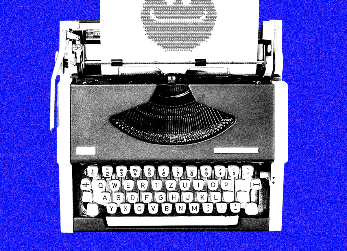 A top-down view of a vintage typewriter on a vibrant blue background. A sheet of white paper is fed into the machine, featuring a large face symbol created using ASCII art.