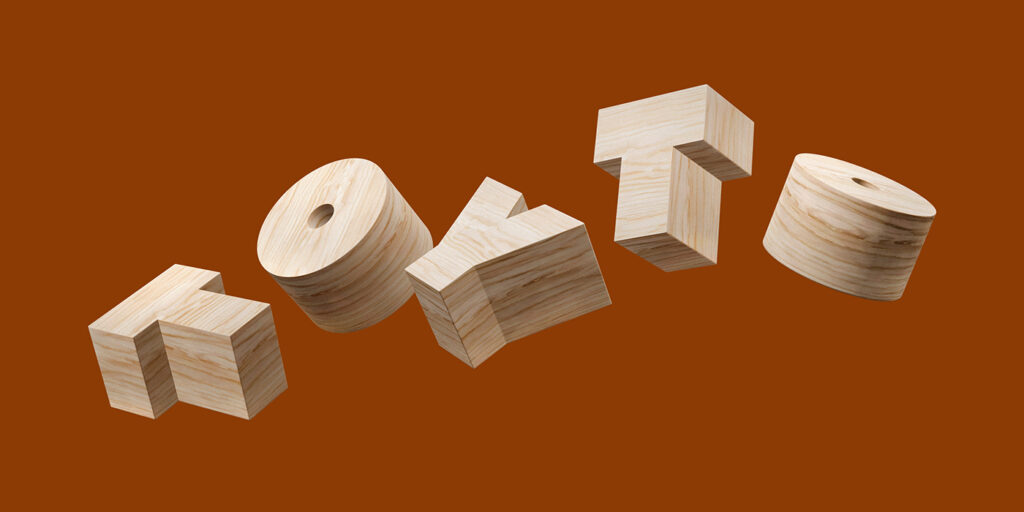 Floating dimensional wooden blocks spelling out TOYTO against a solid warm brown background.