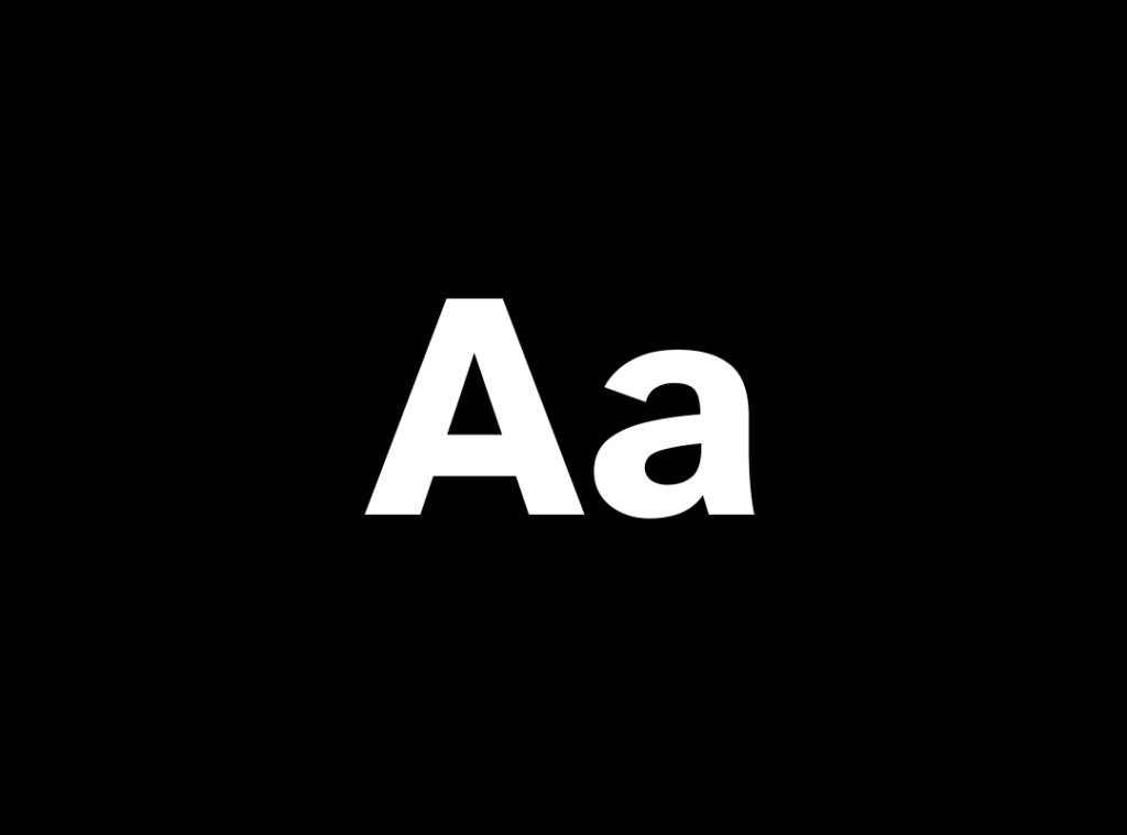Minimalist typographic poster displaying a large, high-contrast black 'Aa' on a clean white background, showcasing the hyper-legible characteristics of the typeface.